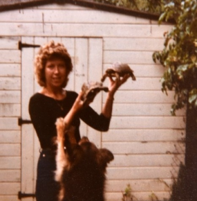 Sheila with a dog and turtles