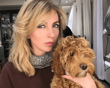 Svetlana and a dog breed Labradoodle