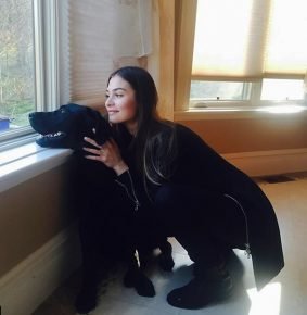 Anastasia Ovechkina with a Labrador