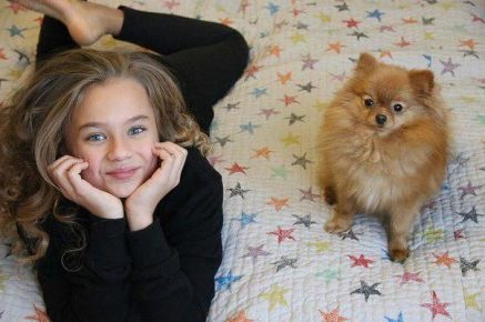 Katya Adushkina with a dog