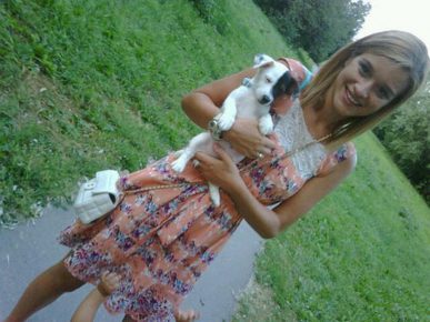 Ksenia Borodina with a Jack Russell Terrier