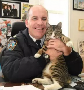 Officer Martin Constanta and the cat