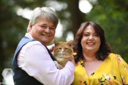Hancock spouses with a cat